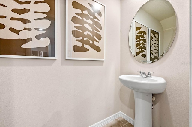 bathroom featuring tile patterned flooring