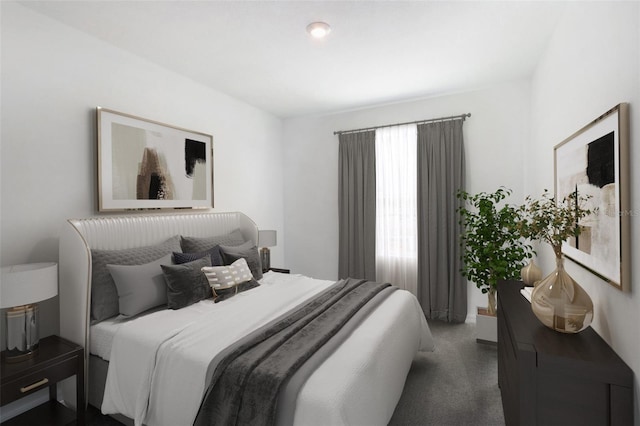 bedroom featuring dark colored carpet