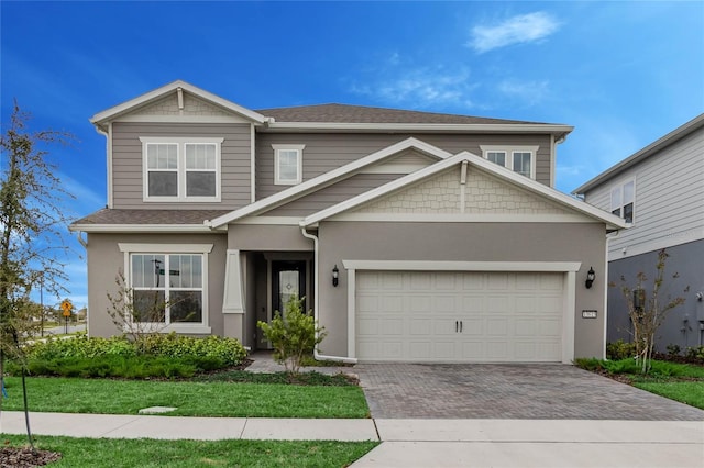 craftsman-style house featuring a garage