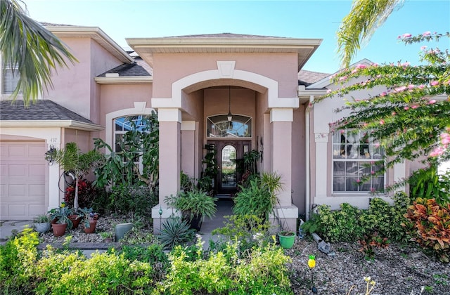 property entrance featuring a garage