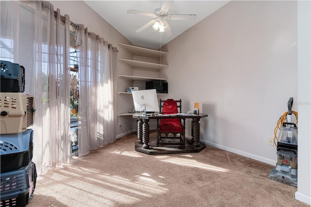 home office with ceiling fan, carpet, and lofted ceiling