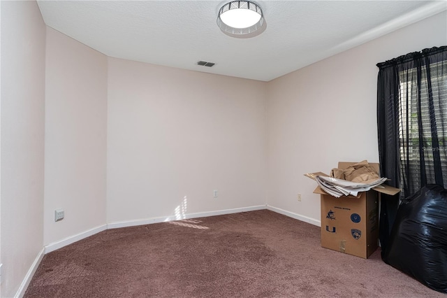 unfurnished room with carpet floors