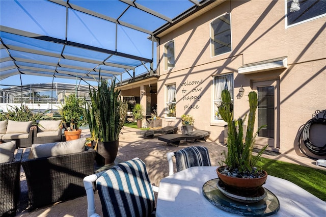 view of patio featuring a lanai and an outdoor living space