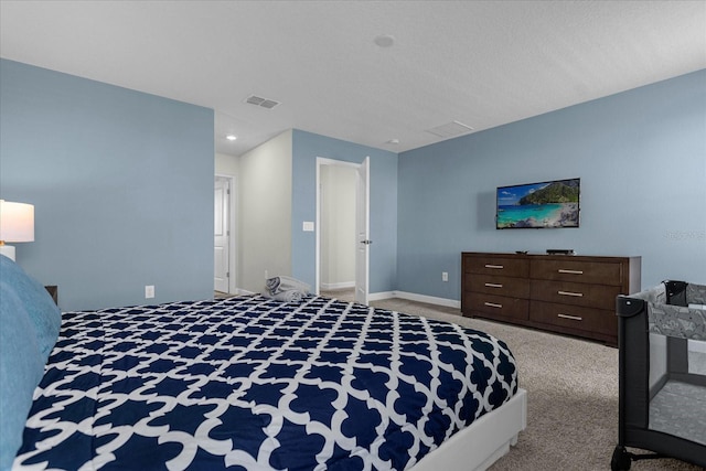 bedroom with light colored carpet