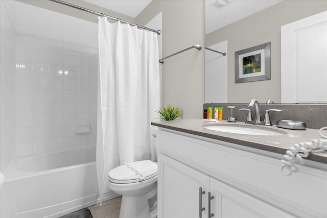 full bathroom featuring shower / tub combo with curtain, vanity, and toilet