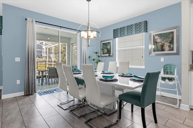 dining room featuring a notable chandelier