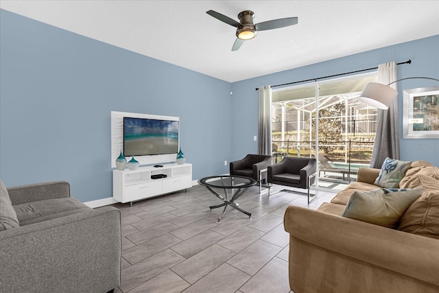 living room featuring ceiling fan