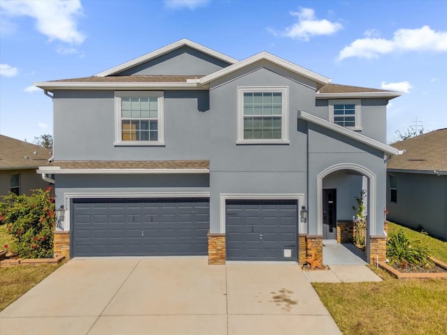 front of property featuring a garage