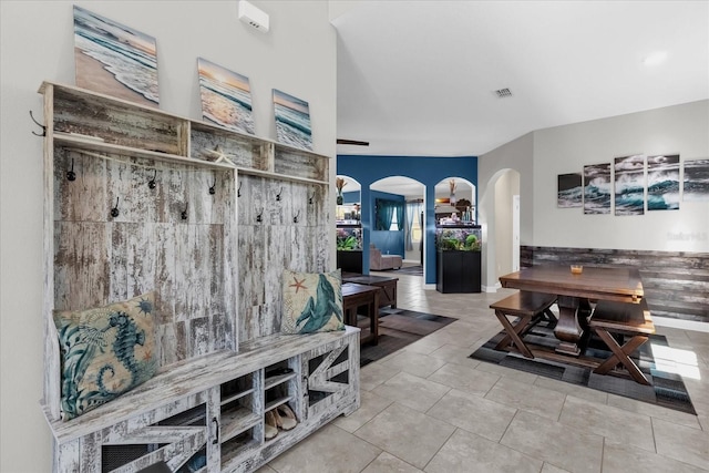 mudroom with light tile patterned floors