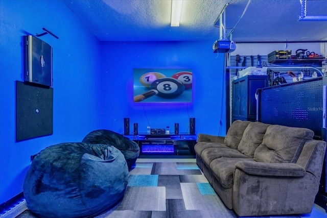 living room with a textured ceiling