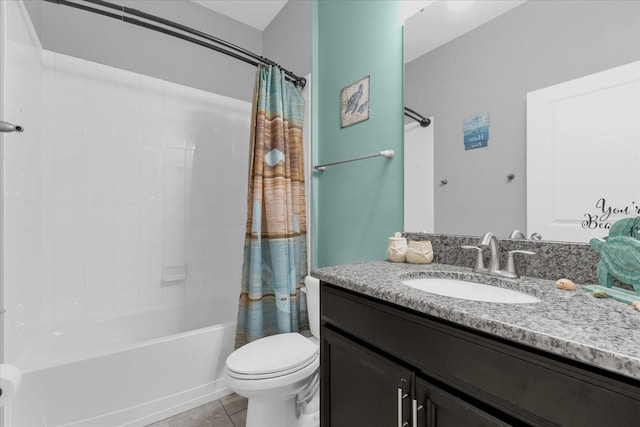 full bathroom with tile patterned flooring, shower / tub combo, vanity, and toilet