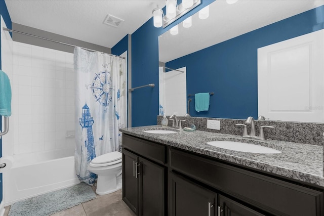 full bathroom with toilet, shower / bath combo, vanity, and tile patterned floors