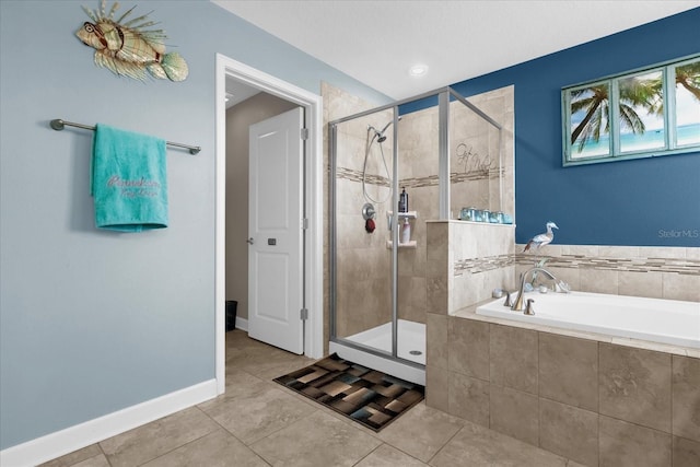 bathroom with plus walk in shower and tile patterned floors