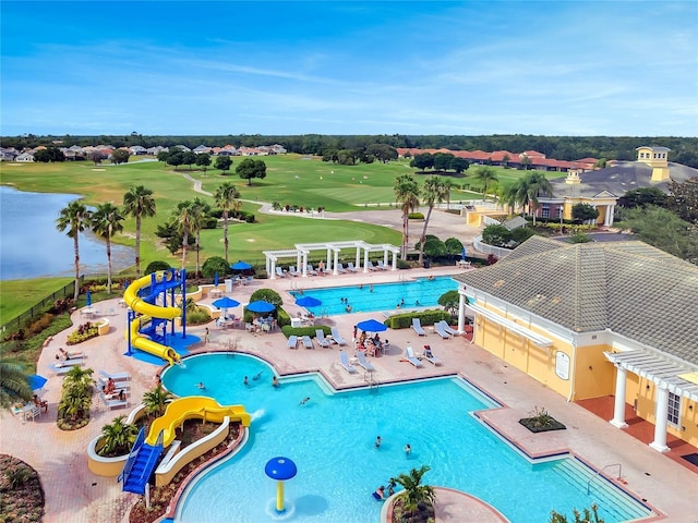 4538 Cortland Dr, Davenport, FL 33837 - view of swimming pool featuring a water view, a patio, a water slide, and a pergola
