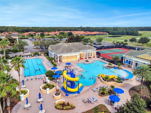 4538 Cortland Dr, Davenport, FL 33837 - view of swimming pool with a water slide and a patio area