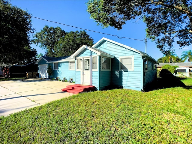 bungalow with a front yard