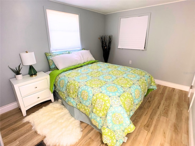 bedroom featuring light hardwood / wood-style flooring