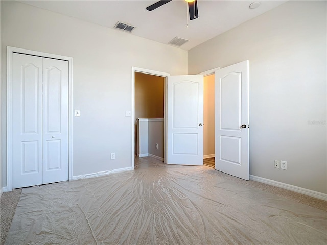 unfurnished bedroom featuring a closet and ceiling fan