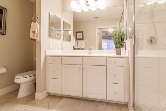 bathroom with vanity, an enclosed shower, tile patterned floors, and toilet