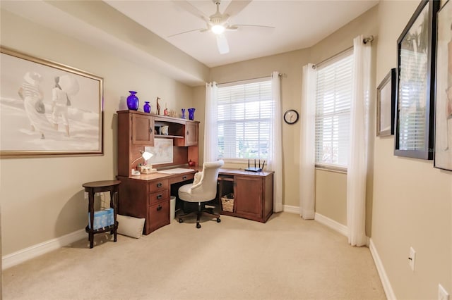 office area with light carpet and ceiling fan