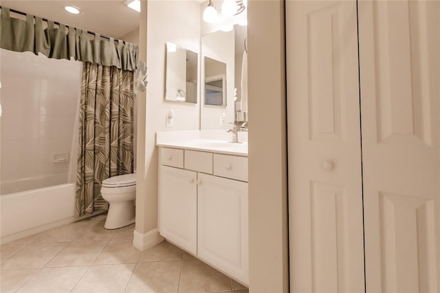 full bathroom featuring tile patterned flooring, vanity, shower / tub combo with curtain, and toilet