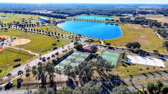 birds eye view of property with a water view