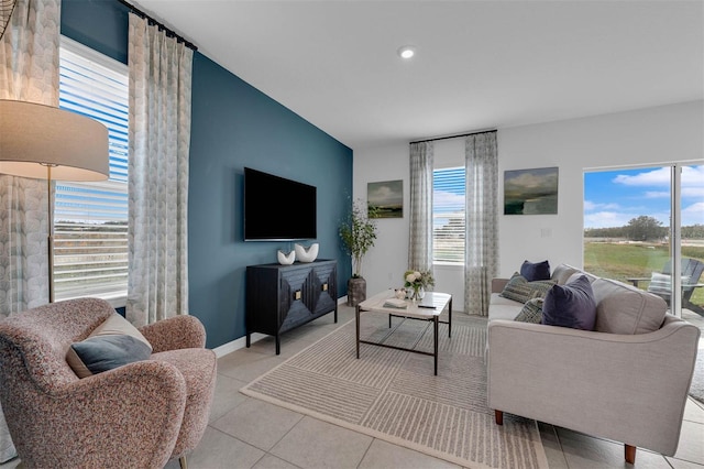 living room featuring light tile patterned flooring