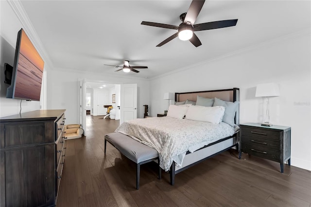 bedroom with dark hardwood / wood-style flooring, ceiling fan, and crown molding