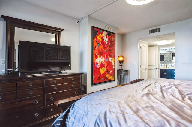 bedroom with a textured ceiling