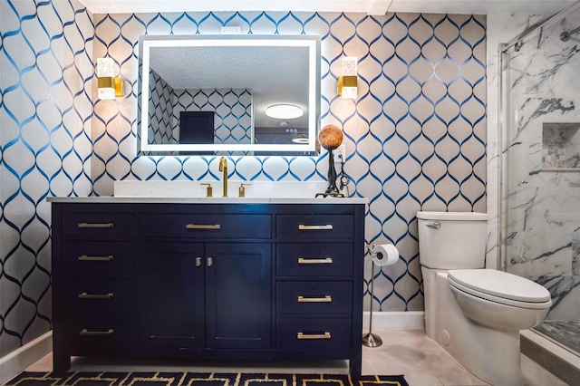 bathroom featuring toilet, tile walls, and vanity