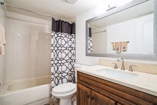 bathroom with vanity, shower / tub combo, and toilet