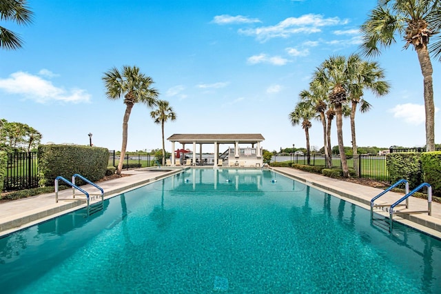 view of swimming pool with a patio area