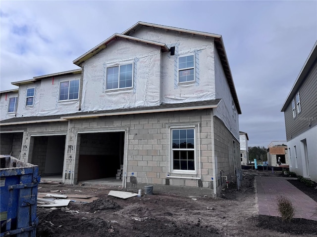 exterior space with a garage