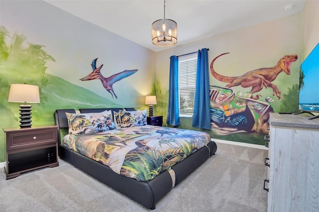 carpeted bedroom featuring an inviting chandelier