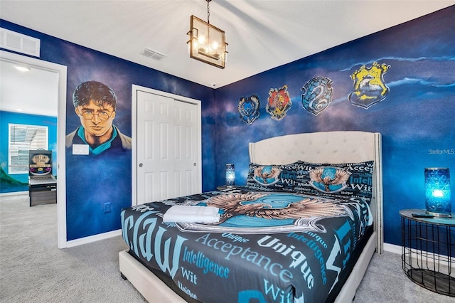 bedroom featuring carpet flooring and a closet