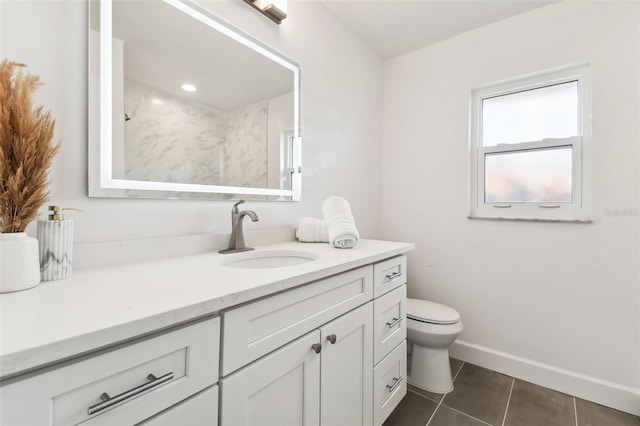 bathroom with toilet, a shower, vanity, and tile patterned floors