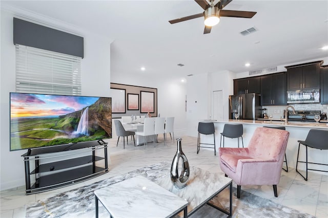 living room featuring ceiling fan