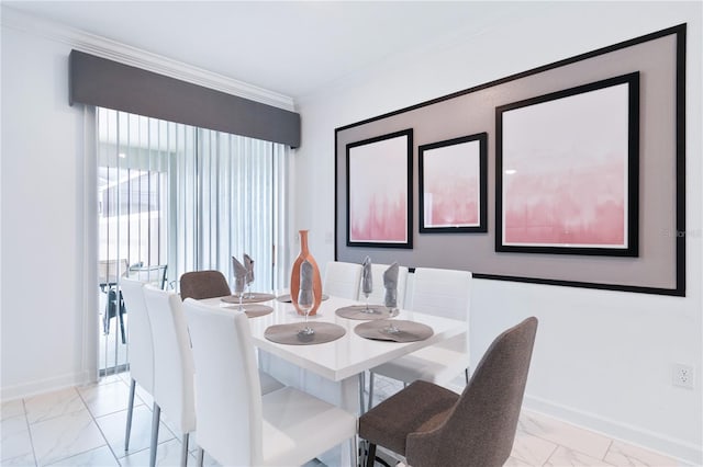 dining room with ornamental molding