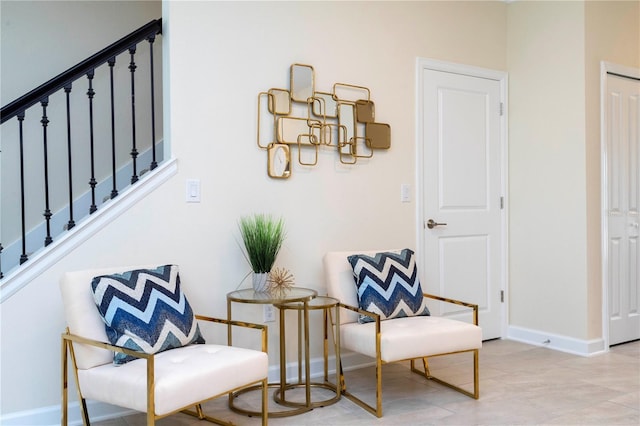 living area featuring light tile patterned flooring