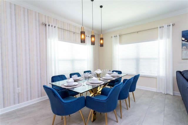 dining room featuring ornamental molding