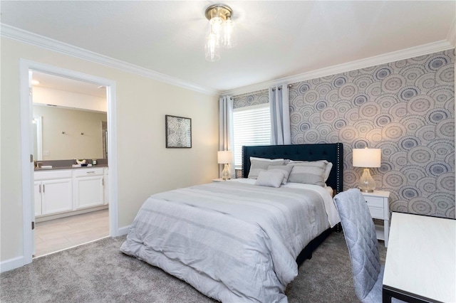 bedroom with ensuite bath, light carpet, sink, and ornamental molding