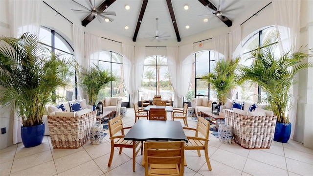 interior space featuring beamed ceiling and ceiling fan