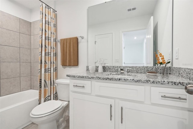 full bathroom featuring vanity, shower / bath combination with curtain, and toilet