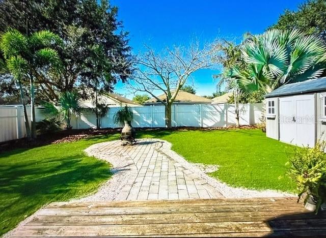 view of yard featuring a wooden deck