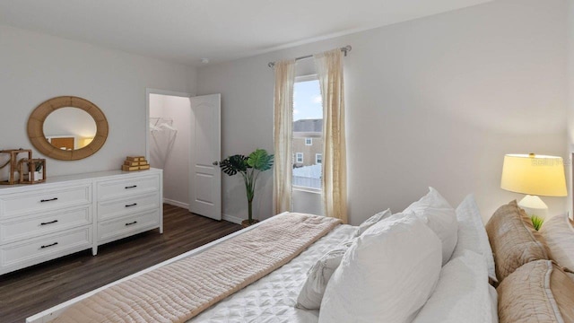 bedroom featuring dark hardwood / wood-style flooring