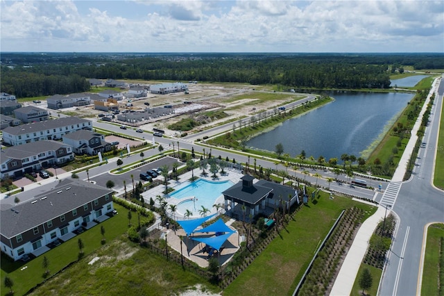 birds eye view of property featuring a water view