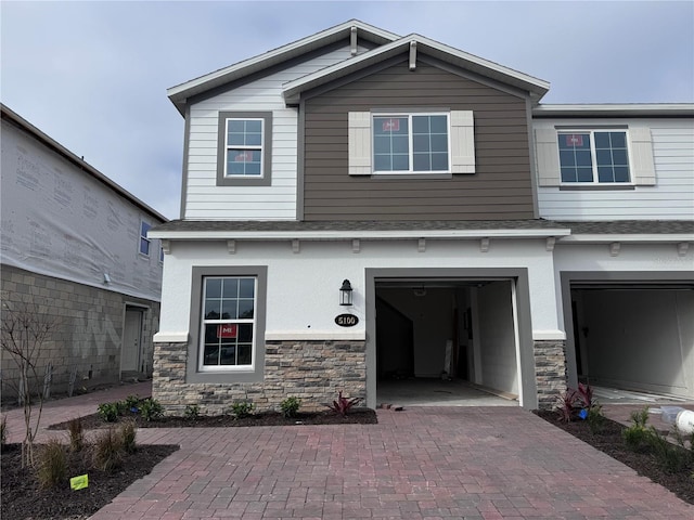 view of front of property featuring a garage