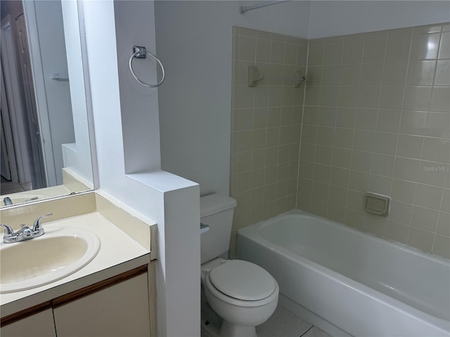 bathroom with vanity, toilet, and shower / washtub combination