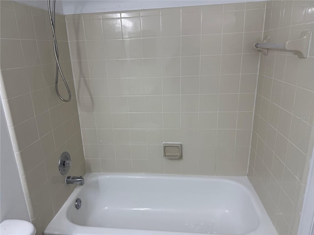 full bath with shower / bath combination and toilet