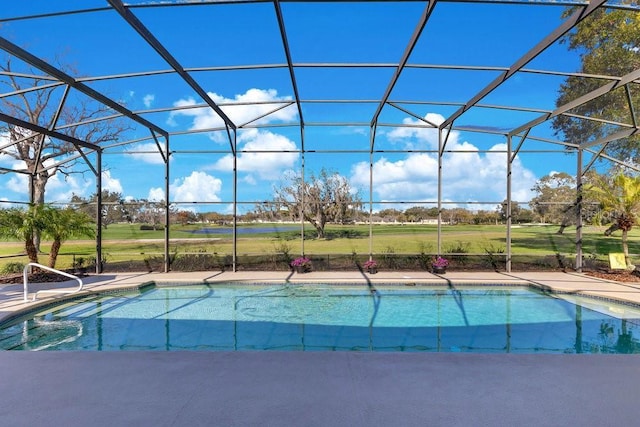 view of pool with a lanai and a patio area